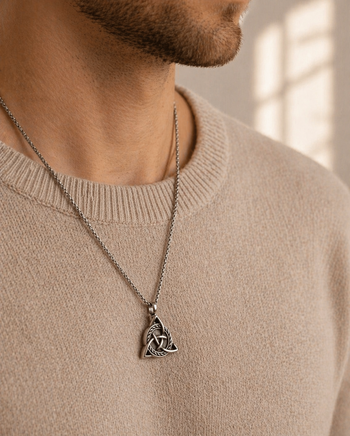 Viking Trinity cremation necklace worn by man — men's stainless steel memorial pendant for ashes