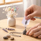 Filling Viking Trinity cremation necklace with ashes — threaded screw closure memorial pendant