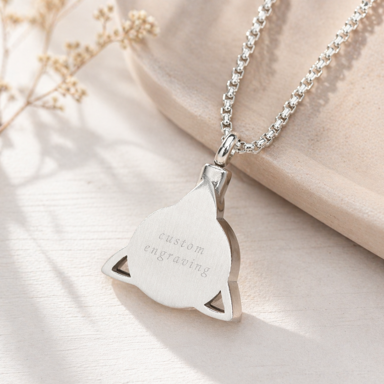 Viking Trinity cremation pendant with custom engraving — stainless steel men's ash necklace close-up